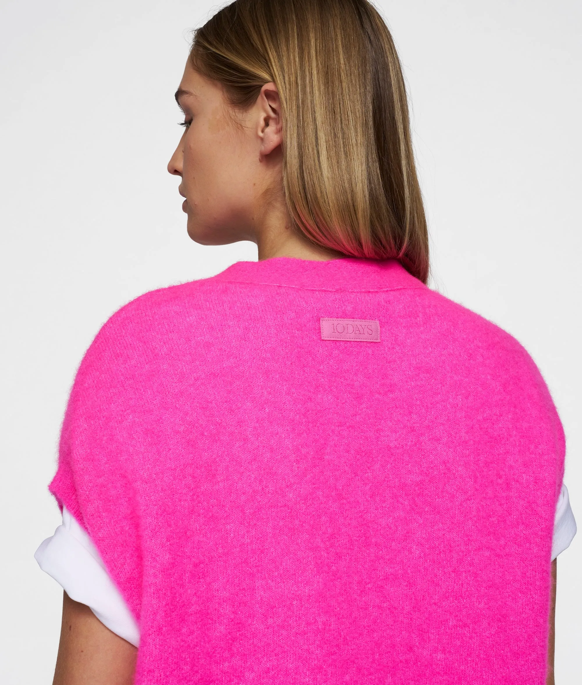 knit gilet | neon pink
